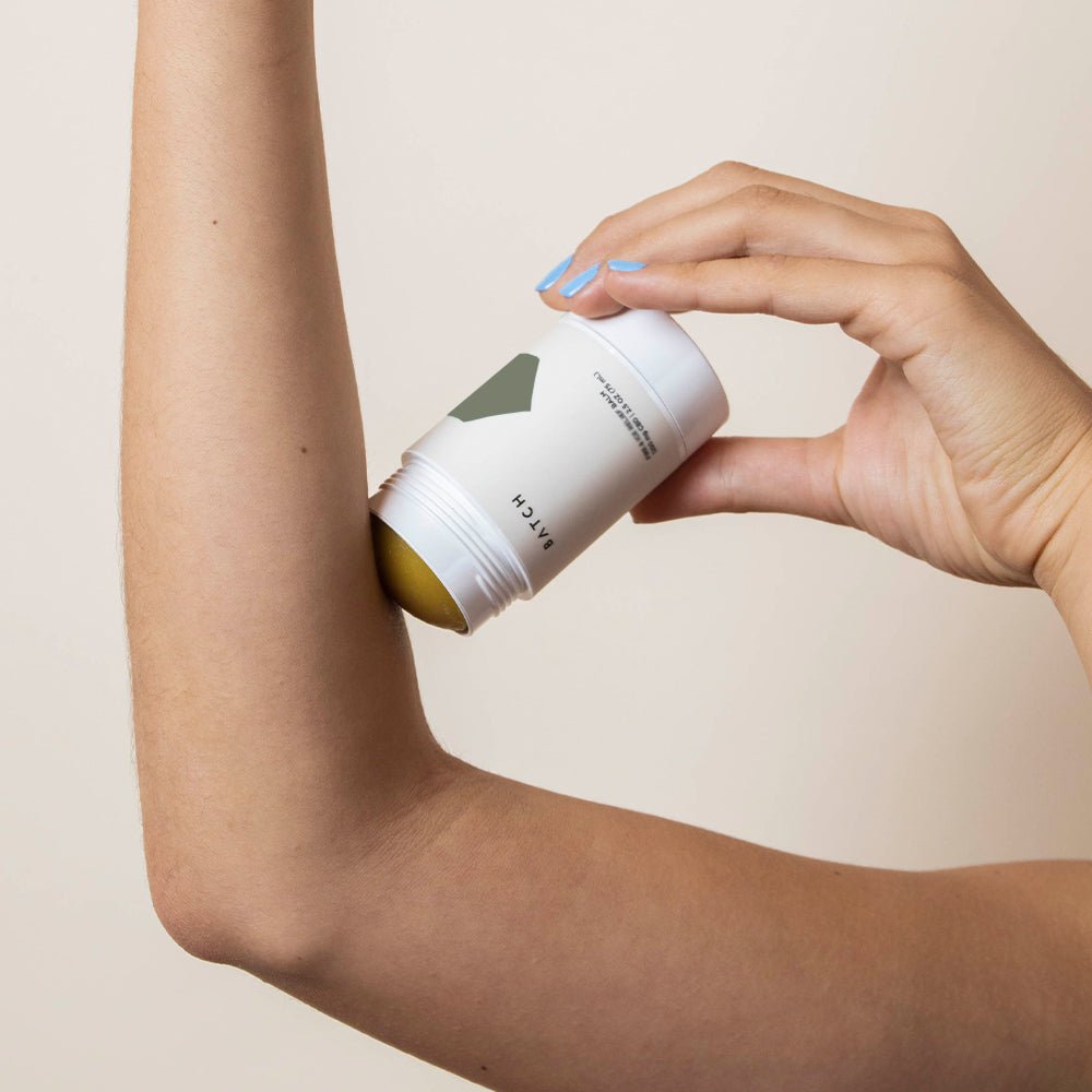 CBD Pain Relief Balm being applied to the arm